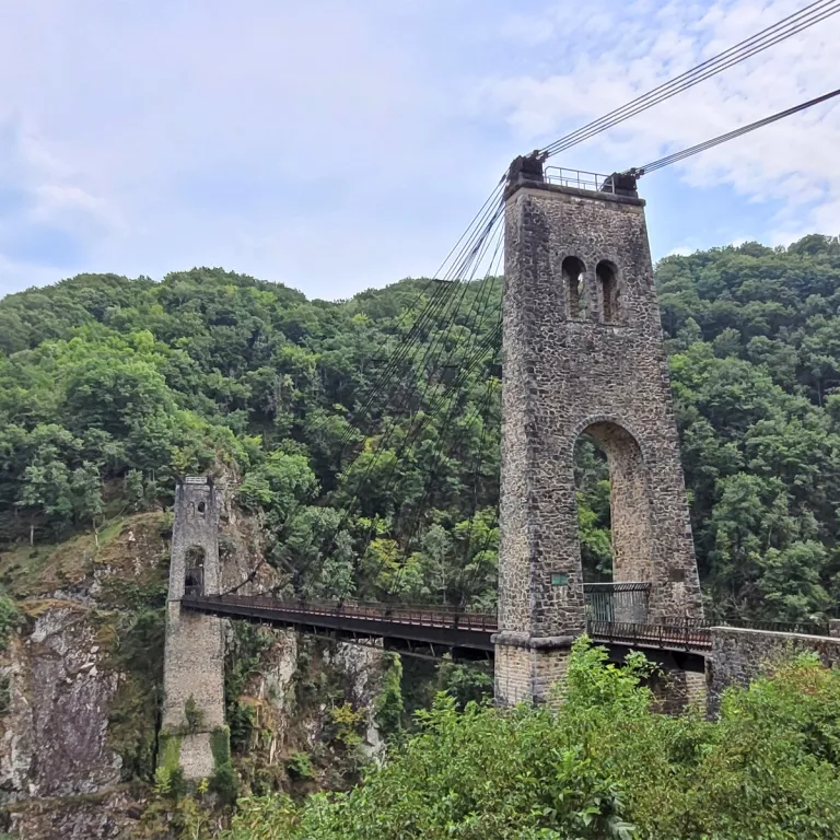 Walk to the Rochers Noirs Viaduct and its susp ...